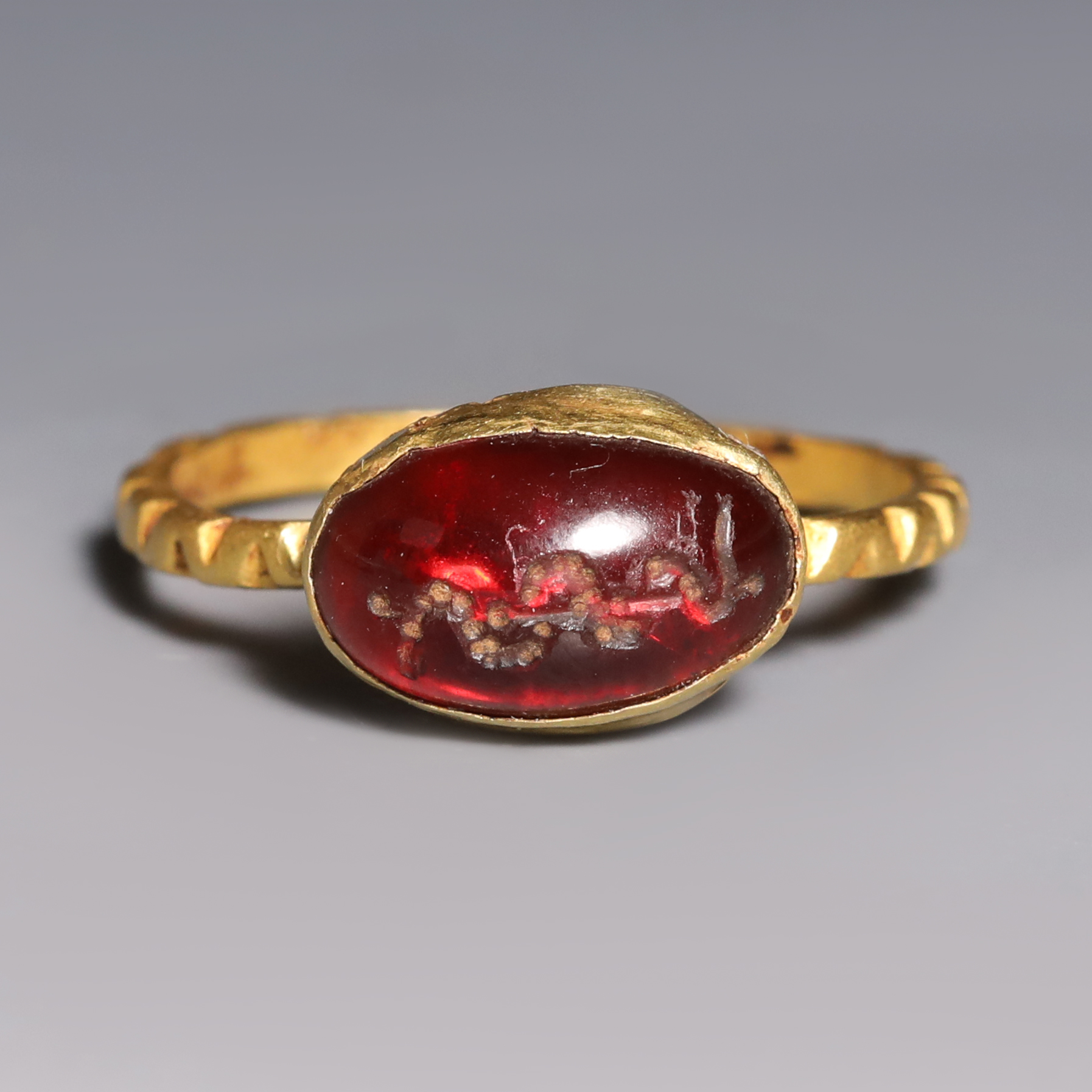 Roman Gold and Garnet Ring with Snake Roman Gold and Garnet Ring with Snake