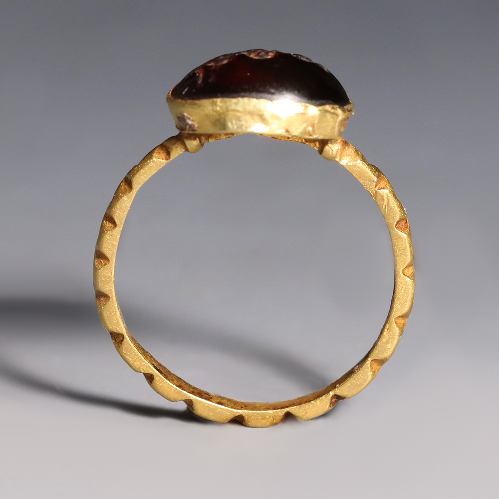 Roman Gold and Garnet Ring with Snake Roman Gold and Garnet Ring with Snake