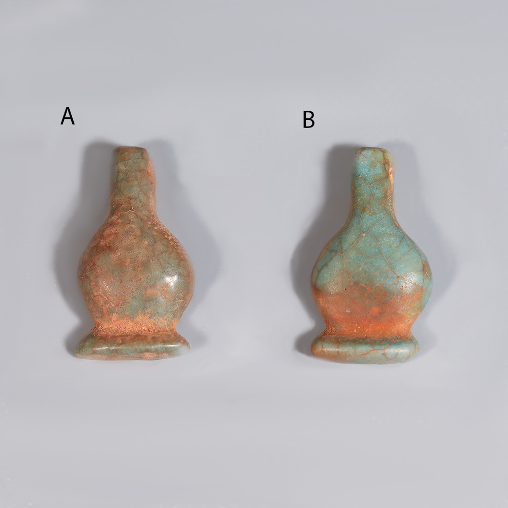 Selection of Ancient Egyptian Turquoise Faience Poppy Amulet Selection of Ancient Egyptian Turquoise Faience Poppy Amulet