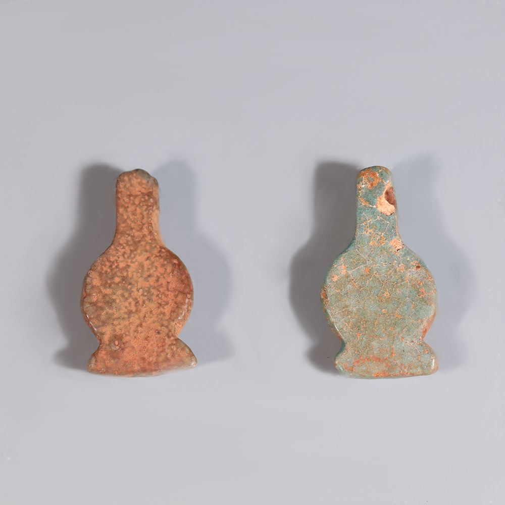 Selection of Ancient Egyptian Turquoise Faience Poppy Amulet Selection of Ancient Egyptian Turquoise Faience Poppy Amulet