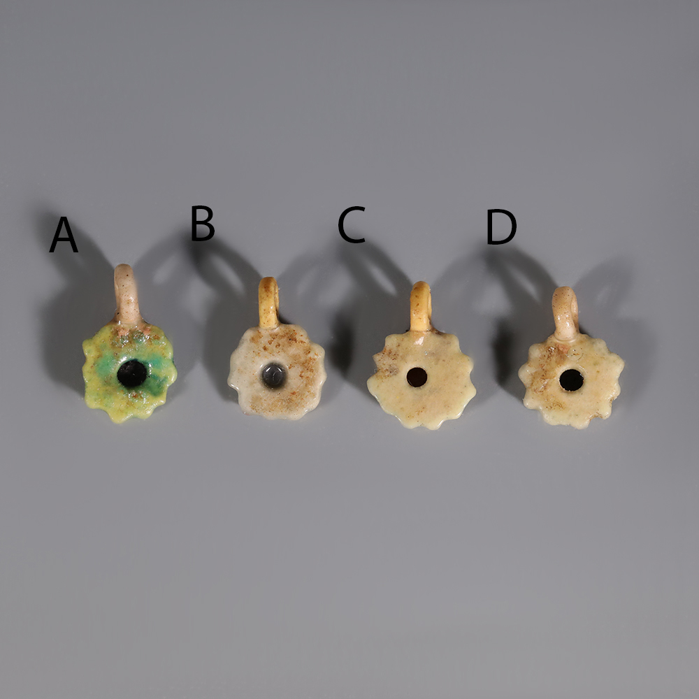 Selection of Ancient Egyptian Faience Daisy Amulet Selection of Ancient Egyptian Faience Daisy Amulet