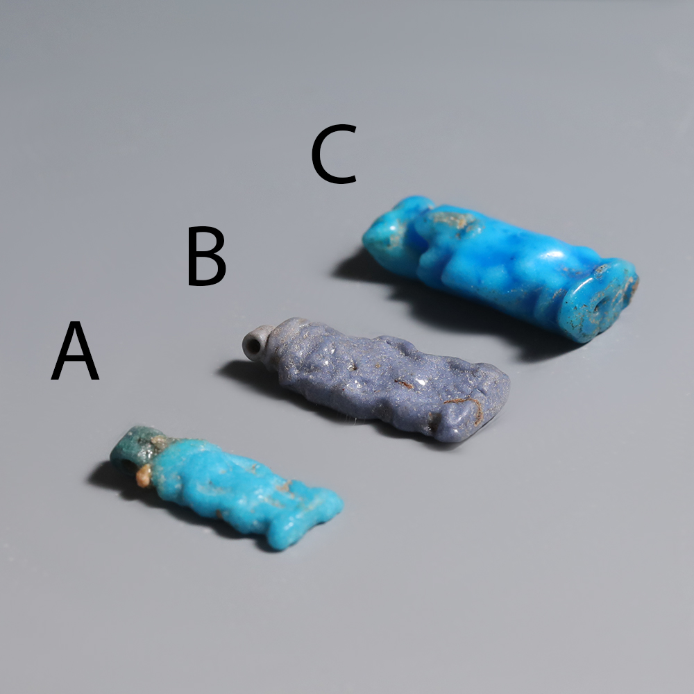 Selection of Egyptian Faience Bes Amulets Selection of Egyptian Faience Bes Amulets